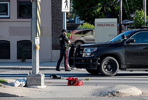 JOHN WOODS / FREE PRESS
Police attend a scene at a crosswalk on Notre Dame in Winnipeg Tuesday, June 11, 2024.  

Reporter: ?