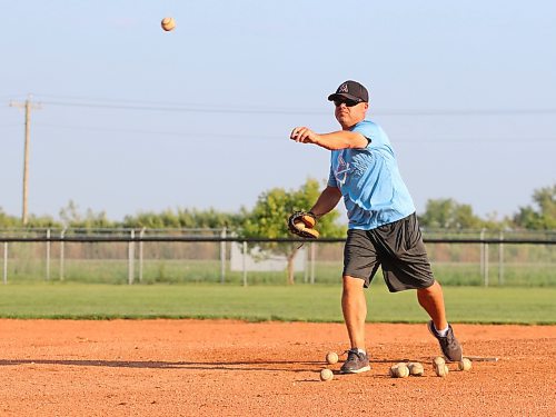 Ryan Boguski throws batting practice during a U13 Brandon Marlins practice last summer. The longtime player has made a smooth transition to coaching. (Perry Bergson/The Brandon Sun) 