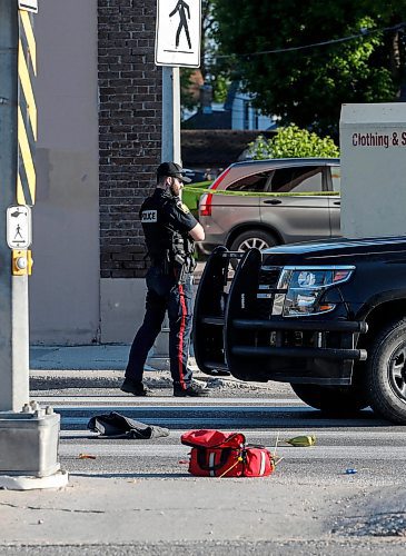 JOHN WOODS / FREE PRESS
Police attend a scene at a crosswalk on Notre Dame in Winnipeg Tuesday, June 11, 2024.  

Reporter: ?