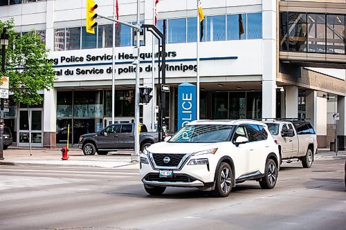 MIKAELA MACKENZIE / FREE PRESS

Cars pass by the police headquarters, where an attempted carjacking occurred yesterday, on Smith Street on Wednesday, June 12, 2024.

For &#x2014; story.

