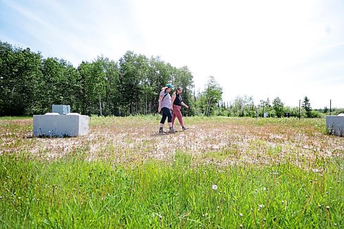 Ruth Bonneville / Free Press

ENT - Folk Fest setting up 

Photo of  Arwen Helene, production manager and (hat) and Valerie Shantz, executive director, in the grassy field where the main stage will soon be set up.  

Subject: Winnipeg Folk Festival site checking out the work that goes on to prepare the grounds for the festival. This is going to run as an event preview and the kick-off to a new series called Behind the Scenes, which looks at the important but often invisible work that happens off stage or out of public view.


Eva Wasney

June 10th, 2024