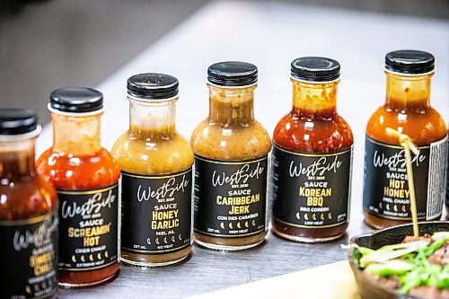 MIKAELA MACKENZIE / FREE PRESS

Westside Premium Craft Sauces at Howard Johnson's in St. James on Wednesday, June 12, 2024. Westside is a line of local craft sauces that is now being sold coast to coast, and is about to make inroads south of the border. 

For Dave Sanderson story.

