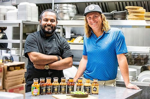 MIKAELA MACKENZIE / FREE PRESS

Ergin Gooriah (left) and Connor Ward, co-owners of Westside Premium Craft Sauce, in the kitchen at Howard Johnson's in St. James on Wednesday, June 12, 2024. Westside is a line of local craft sauces that is now being sold coast to coast, and is about to make inroads south of the border. 

For Dave Sanderson story.

