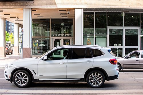 MIKAELA MACKENZIE / FREE PRESS

Cars pass by the police headquarters, where an attempted carjacking occurred yesterday, on Smith Street on Wednesday, June 12, 2024.

For &#x2014; story.

