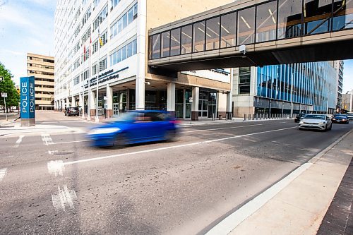 MIKAELA MACKENZIE / FREE PRESS

Cars pass by the police headquarters, where an attempted carjacking occurred yesterday, on Smith Street on Wednesday, June 12, 2024.

For &#x2014; story.

