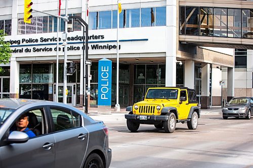 MIKAELA MACKENZIE / FREE PRESS

Cars pass by the police headquarters, where an attempted carjacking occurred yesterday, on Smith Street on Wednesday, June 12, 2024.

For &#x2014; story.

