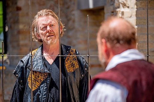 NIC ADAM / FREE PRESS
Shakespeare in the Ruins&#x2019; celebration of theatre continues at the Trappist Monastery Provincial Heritage Park with a new Canadian play. Iago Speaks runs for 11 performances between June 14 and July 7. 
Left: Iago, played by Arne MacPherson.
Right: The Jailor, played by Joshua Beaudry.

Arne MacPherson as Iago, and Joshua Beaudry as The Jailor, act in a scene from the play Iago Speaks.

240612 - Wednesday, June 12, 2024.

Reporter: ?