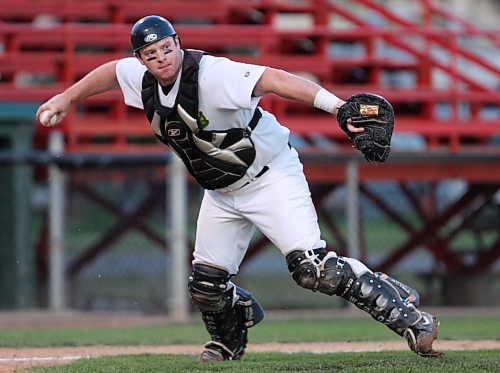 Bryan Swaenepoel of the Brandon Cloverleafs picks up the ball after a bunt and throws it to first base during Game 6 of the 2009 Manitoba Senior Baseball League final against the Brandon Marlins at Andrews Field. The Cloverleafs defeated the Marlins 4-2 to win the championship. (Tim Smith/Brandon Sun)