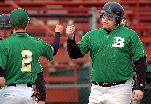 Bryan Swaenepoel is congratulated after hitting a three-run homer in the first inning for the Brandon Cloverleafs during a Manitoba Senior Baseball League game at Andrews Field. (Brandon Sun file photo)