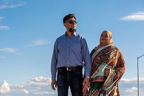 BROOK JONES / FREE PRESS
Danish Habib (left) and his wife Urooj Danish who are both Muslim are pictured walking around their neighbourhood in La Salle, Man., Thursday, June 13, 2024. The couple participated in a Hajj pilgrimage to Makkah, Saudi Arabia in 2017.