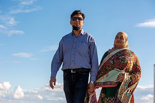 BROOK JONES / FREE PRESS
Danish Habib (left) and his wife Urooj Danish who are both Muslim are pictured walking around their neighbourhood in La Salle, Man., Thursday, June 13, 2024. The couple participated in a Hajj pilgrimage to Makkah, Saudi Arabia in 2017.