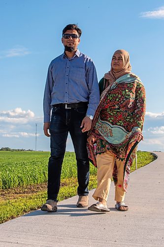 BROOK JONES / FREE PRESS
Danish Habib (left) and his wife Urooj Danish who are both Muslim are pictured walking around their neighbourhood in La Salle, Man., Thursday, June 13, 2024. The couple participated in a Hajj pilgrimage to Makkah, Saudi Arabia in 2017.