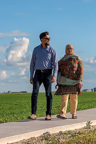 BROOK JONES / FREE PRESS
Danish Habib (left) and his wife Urooj Danish who are both Muslim are pictured walking around their neighbourhood in La Salle, Man., Thursday, June 13, 2024. The couple participated in a Hajj pilgrimage to Makkah, Saudi Arabia in 2017.