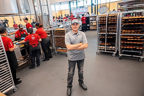 NIC ADAM / FREE PRESS
Krispy Kreme had the grand opening of its first Winnipeg location on the corner of Sterling Lyon Pkwy. and Kenaston Blvd. Thursday afternoon.
George Upadhyaya, District Manager, poses for a photo in the back of Winnipeg&#x2019;s new Krispy Kreme store.
240613 - Thursday, June 13, 2024.

Reporter: Eva Wasney
