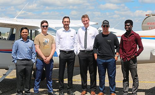 Graduates of the first-ever aviation management certificate program offered through a partnership with Brandon Flight Centre and Assiniboine College. From left, Lance Llagis, Bryce Crofton, Shane Anderson, Alex Smith, Matty Harold and Samuel Olayiwola. (Photos by Michele McDougall/The Brandon Sun) 