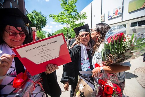 MIKAELA MACKENZIE / FREE PRESS

Berens River education director Kristen Everett (right) embraces U of W Developmental Studies program graduate Ida May MacDonald on Friday, June 14, 2024. 

For Jura story.

