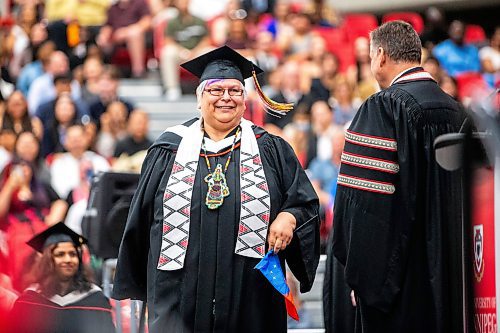 MIKAELA MACKENZIE / FREE PRESS

U of W&#x573; Developmental Studies program graduate Vivian Scott crosses the stage on Friday, June 14, 2024. 

For Jura story.

