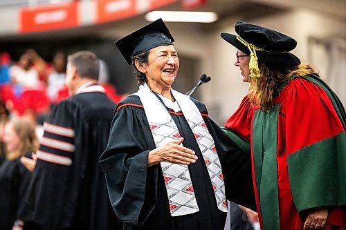 MIKAELA MACKENZIE / FREE PRESS

U of W Developmental Studies program graduate Victoria Antsanen embraces program director Sheri-Lynn Skwarchuk while crossing the stage on Friday, June 14, 2024. 

For Jura story.

