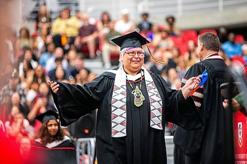 MIKAELA MACKENZIE / FREE PRESS

U of W&#x573; Developmental Studies program graduate Vivian Scott crosses the stage on Friday, June 14, 2024. 

For Jura story.

