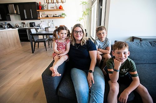 MIKAELA MACKENZIE / FREE PRESS

Steph Seier and her kids, Brooklyn (four, left), Theo (six), and  Connor (nine), at their home on Thursday, June 13, 2024. Steph is a full time nurse who has three kids and got so desperate for child care she joined the board of her kids' daycare, became president, and pushed for a new school age child care centre -- which was eventually built.

For Katrina story.

