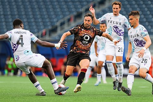 Daniel Crump / Winnipeg Free Press. Winnipeg&#x573; Jordan Swibel (9) is set upon from all sides by Pacific defenders. Valour FC take on Pacific FC in the last of a three game homestead at Winnipeg Stadium Friday night. June 14, 2024.