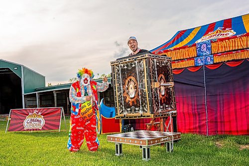 NIC ADAM / FREE PRESS
Red River Ex opened for the season Friday afternoon. The RRE is an annual carnival held at the Assiniboia Downs.
Doo Doo the Clown, and his son Aaron Matthews, pose for a photo at the Red River Ex. Doo Doo said that this was a special gig because The Red River Ex is his favourite place to perform and that he got to perform at the same place as his son for Fathers Day.
240614 - Friday, June 14, 2024.

Reporter: ?
