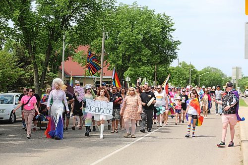 The Brandon Pride March approaches Rideau Park on Saturday. (Colin Slark/The Brandon Sun)