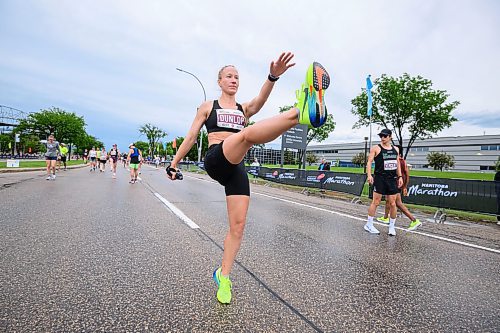 Mike Sudoma/Free Press
Runner Maggie Dunlop warms up prior to her half marathon run at the 46th annual Manitoba Marathon Sunday morning at Princess Auto Stadium
June 15, 2024
