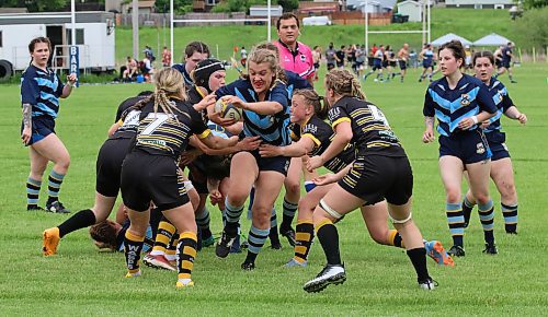 Abby Bakan of the Brandon Barbarians runs into a swarm of Wasps during a Rugby Manitoba Women's Premier League game at John Reilly Field on Saturday. The Wasps earned a 27-17 victory. The Barbs will be profiled in a story later this week. (Perry Bergson/The Brandon Sun)
June 17, 2024