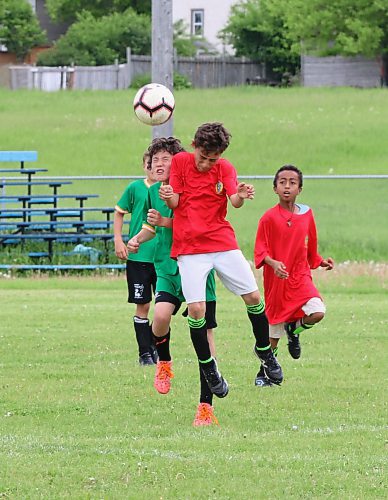 Yahya Masri of Brandon United (in red) heads the ball as a Swan River defender (in green) competes for it on Saturday afternoon at John Reilly Field. The Swan River and Brandon-based teams met for a series of friendlies in different age groups. (Perry Bergson/The Brandon Sun)
June 17, 2024