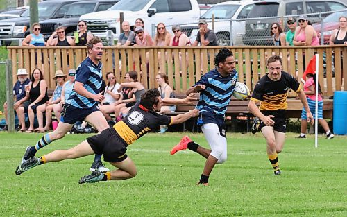 A Wasps defender unsuccessfully dives to try and stop Brandon Barbarian Miguel Dominguez during a Rugby Manitoba Men's Division 2 game at John Reilly Field on Saturday. The attempted tackle did slow Dominguez down enough for another tackler to get him a moment later, but the Barbarian had a try and seven converts for 19 points in a 61-0 Brandon victory. (Perry Bergson/The Brandon Sun)
June 17, 2024