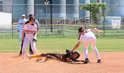 Westman Magic base runner Zaree Routledge (7) of the RM of Wallace-Woodworth slides safely under the tag of Smitty's Terminators shortstop Tayah Grant (22) of Winnipeg during under-13 Manitoba Premier Softball League action at Ashley Neufeld Softball Complex on Sunday. (Perry Bergson/The Brandon Sun)
June 17, 2024