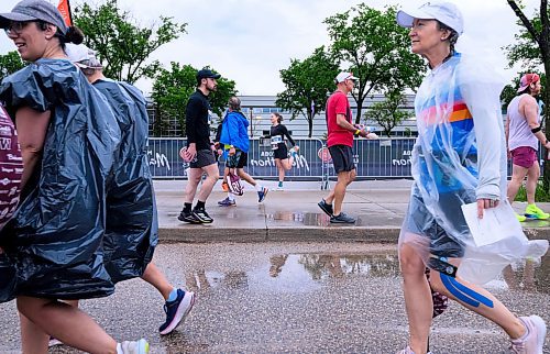 Mike Sudoma/Free Press
A runners warm up and head to their starting position as the Sunday morning rain subsides prior to the 46th annual Manitoba Marathon at Princess Auto Stadium
June 15, 2024
