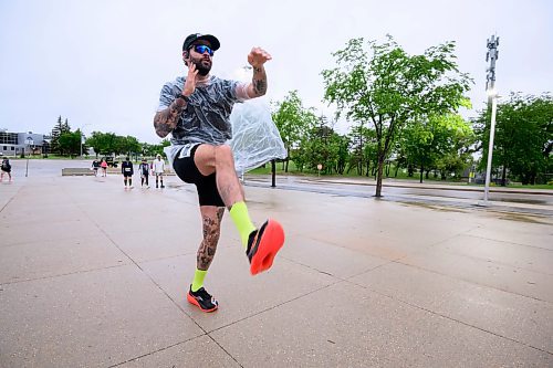 Mike Sudoma/Free Press
Runner Eric Marshall warms up to run his first full marathon Sunday at the 46th annual Manitoba Marathon at Princess Auto Stadium
June 15, 2024
