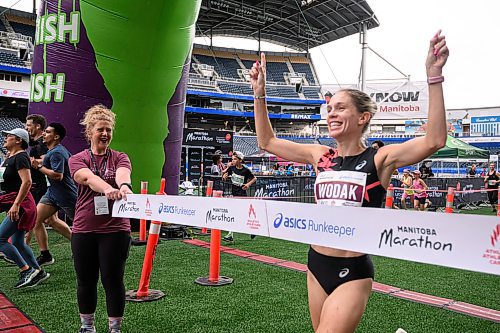 Mike Sudoma/Free Press
Runner Natasha Wodak finishes first in the female half marathon at the 46th annual Manitoba Marathon Sunday morning
June 15, 2024
