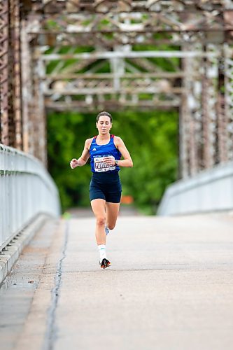 BROOK JONES / FREE PRESS
Dayna Pidhoresky, who represented Canada in the women's full marathon at the 2021 Summer Olympic Games, crosses the BDI bridge in the Half Marathon National Championships at the Manitoba Marathon in Winnipeg, Man., Sunday, June 16, 2024.