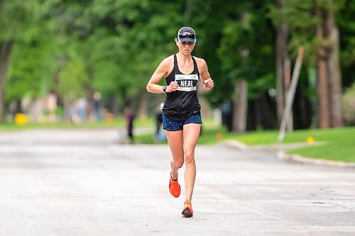 BROOK JONES / FREE PRESS
Winnipegger Dawn Neil runs down Wellington Crescent on her way to winning the women's full marathon, which was the 46th running of the Manitoba Marathon in Winnipeg, Man., Sunday, June 16, 2024.