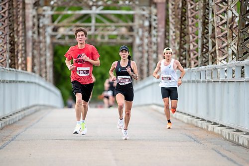 BROOK JONES / FREE PRESS
Runners cross the BDI bridge as they compete in half marathon at the 46th Manitoba Marathon in Winnipeg, Man., Sunday, June 16, 2024.