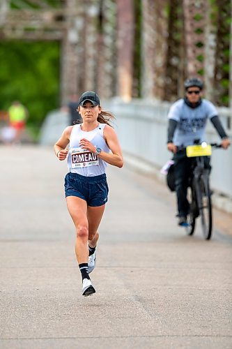 BROOK JONES / FREE PRESS
Anne-Marie Comeau from Quebec crosses the BDI bridge on her way to finishing third in the women's section of the Half Marathon National Championships at the Manitoba Marathon in Winnipeg, Man., Sunday, June 16, 2024.