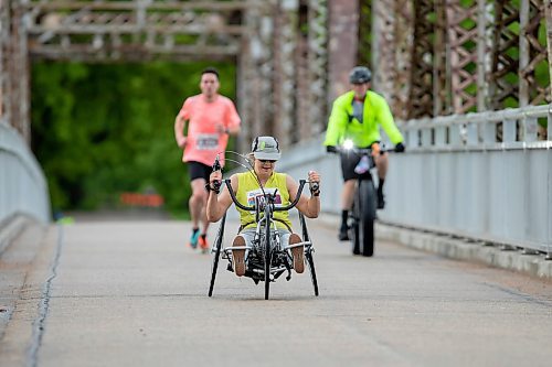 BROOK JONES / FREE PRESS
An athlete crosses the BDI bridge while competing in the wheelchair section of the half marathon at the 46th Manitoba Marathon in Winnipeg, Man., Sunday, June 16, 2024.