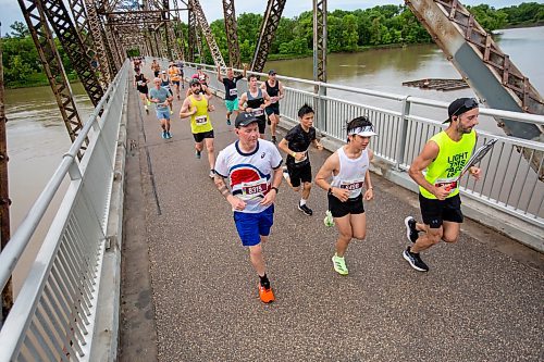 BROOK JONES / FREE PRESS
Runners cross the BDI bridge in the half marathon race at the 46th annual Manitoba Marathon in Winnipeg, Man., Sunday, June 16, 2024.