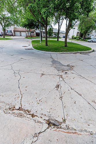 MIKE DEAL / FREE PRESS
Greensboro Bay
The condition of the streets in Waverley Heights. Specifically Augusta Drive and Greensboro Bay, showing potholes, crumbling curbs, cracks in the pavement.
240613 - Thursday, June 13, 2024.