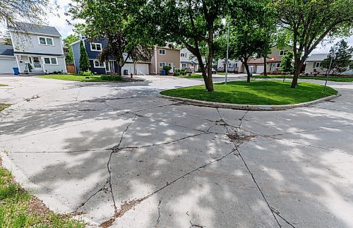 MIKE DEAL / FREE PRESS
Greensboro Bay
The condition of the streets in Waverley Heights. Specifically Augusta Drive and Greensboro Bay, showing potholes, crumbling curbs, cracks in the pavement.
240613 - Thursday, June 13, 2024.