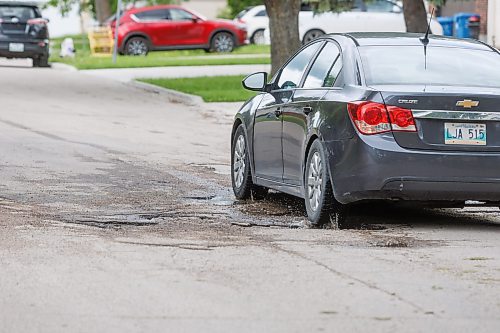 MIKE DEAL / FREE PRESS
The road conditions along the stretch of Augusta Drive between Lakeside Drive and Chancellor Drive is quiet bad.
The condition of the streets in Waverley Heights. Specifically Augusta Drive and Greensboro Bay, showing potholes, crumbling curbs, cracks in the pavement.
240613 - Thursday, June 13, 2024.