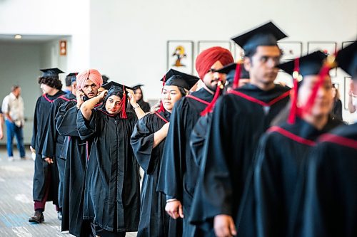 MIKAELA MACKENZIE / FREE PRESS

RRC Polytech graduates take part in the procession into their graduation ceremony at the RBC Convention Centre on Monday, June 17, 2024. 

For Matthew Frank story.

