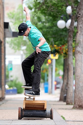 Lukas Trout skateboards along Rosser Avenue in downtown Brandon on Tuesday. Friday is Go Skateboarding Day, with events planned at the Kristopher Campbell Memorial Skate Plaza. (Tim Smith/The Brandon Sun)