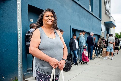 MIKAELA MACKENZIE / FREE PRESS

Denise Houston waits in line for the food bank at Agape Table on Furby Street on Tuesday, June 18, 2024. The organization is currently experiencing an unprecedented increase in requests for food assistance, and is putting out the call for more donations to support the need.

For Jura story.

