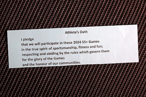 18062024
A print out of the athlete&#x2019;s oath sits on a chair during the opening ceremonies for the 2024 Manitoba 55+ Games at the Dome Building on Tuesday. (Tim Smith/The Brandon Sun)