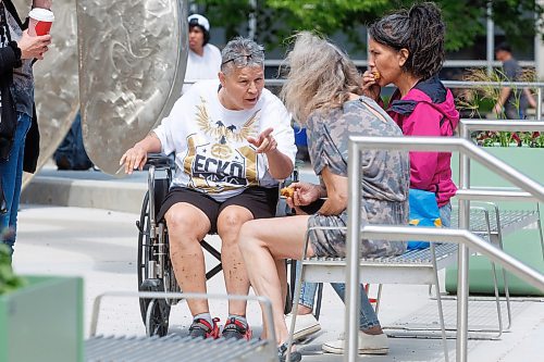 MIKE DEAL / FREE PRESS
Sandra Guiboche (in wheelchair), sits outside the Law Courts Building during a break for lunch in her trial Wednesday. Guiboche has alleged to have been dealing drugs in the Point Douglas area off and on for 25 years and was the primary target of a lengthy police investigation dubbed Project Matriarch.
240619 - Wednesday, June 19, 2024.