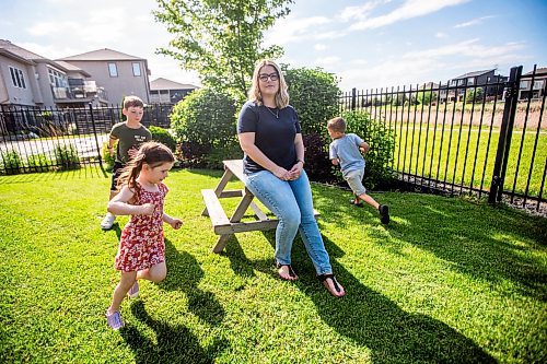 MIKAELA MACKENZIE / FREE PRESS

Steph Seier and her kids, Connor (nine, left), Brooklyn (four), and Theo (six) at their home on Thursday, June 13, 2024. Steph is a full time nurse who has three kids and got so desperate for child care she joined the board of her kids' daycare, became president, and pushed for a new school age child care centre -- which was eventually built.

For Katrina story.

